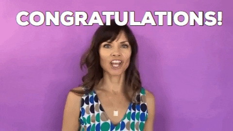 Woman in the purple background saying congratulations