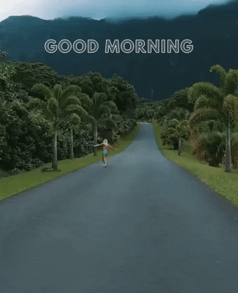 Girl jogging in a beautiful tropical road in the morning