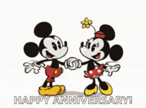 Mickey and Minnie kiss for a Happy Anniversary greeting