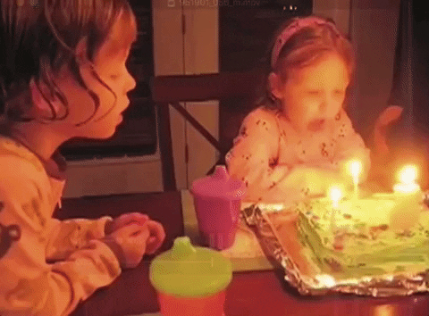 Little girl is excited to blow her candles but her big brother blows it first