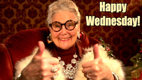A fashionable granny gives two thumbs up for a Happy Wednesday