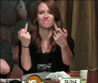 This woman is clearly frustrated as she shows two middle fingers to everyone