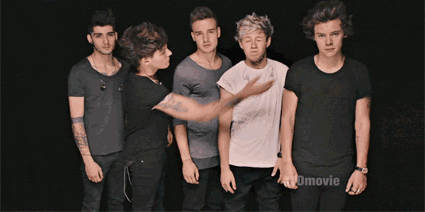 Louis slaps Niall during a photoshoot