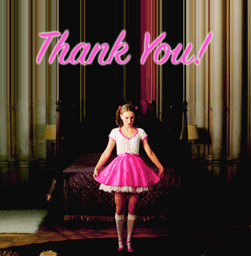 Girl in pink dress saying thank you