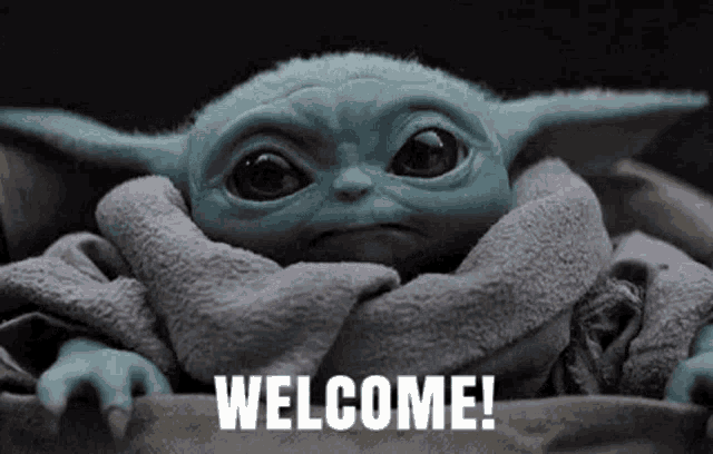 Baby Yoda waves his hand to welcome everyone