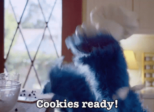 Cookie Monster is excited that the cookies are ready