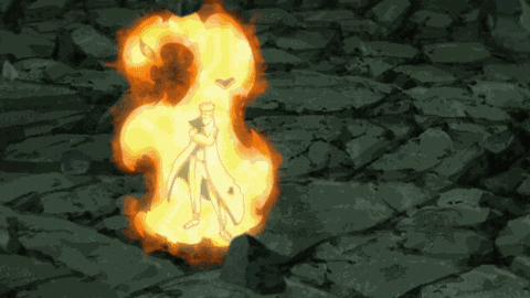 Naruto in Kyubi chakra mode catches a large shuriken