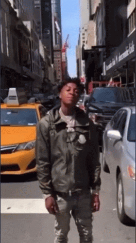 Youngboy Nba raps in the middle of a busy road