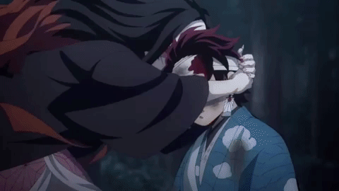Nezuko hugs Tanjiro