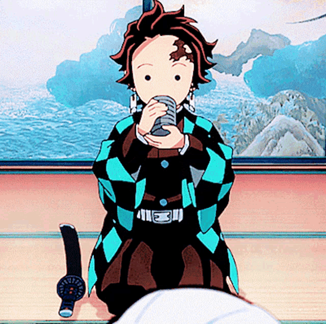 Cute Tnajiro drinking tea