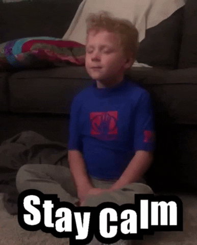 This little kid takes a deep breath and tries to stay calm