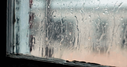 A close-up look at the window pane during the rain